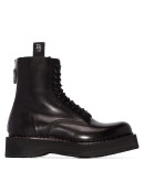 Stack 40 military boots