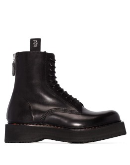 Stack 40 military boots
