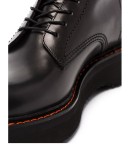 Stack 40 military boots