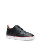 piped-trim textured brogues