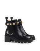 Leather ankle boot with belt