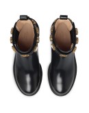 Leather ankle boot with belt