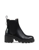 Leather ankle boot with belt