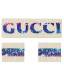 sequinned headband and wrist cuffs