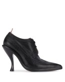 curved heel pebbled brogues