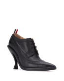 curved heel pebbled brogues