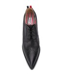 curved heel pebbled brogues