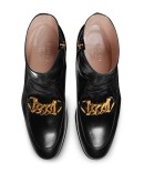 Horsebit chain loafer boots