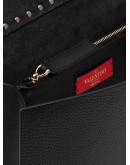 Rockstud leather clutch
