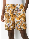 tiger-print Bermuda shorts
