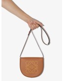 Heel perforated mini bag