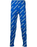 all-over logo slim track pants