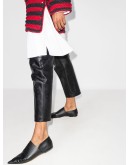 Perforated anagram flat pumps