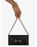 Horsebit leather clutch bag