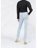 Medusa print skinny jeans
