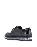 transparent sole brogues
