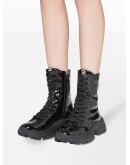 patent-finish lace-up boots