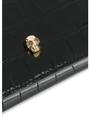 crinkled leather clutch bag