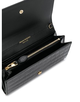 crinkled leather clutch bag