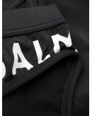 black swimming trunks with logo print at the side