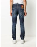 distressed look jeans with maple leaf patch
