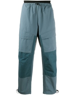 swoosh-logo track pants