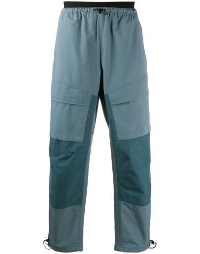 swoosh-logo track pants