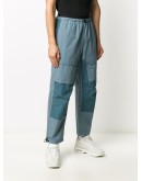 swoosh-logo track pants