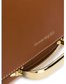 handle-detail clutch bag