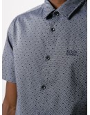 polka-dot shortsleeved shirt