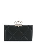 4-ring quilted clutch bag